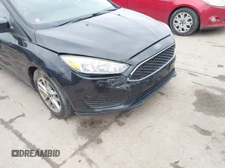 2015 Ford Focus SE with VIN 1FADP3F21FL355666, listed as a IAAI auction lot 41828579 with 110,002 mi miles. Bid and sale history available at carsss.com. Image 6.
