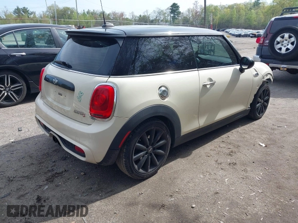 2014 MINI Hardtop S with VIN WMWXM7C55ET970769, listed as a IAAI auction lot 42181868 with 173,839 mi miles and . Bid and sale history available at DreamBid. Image 4.