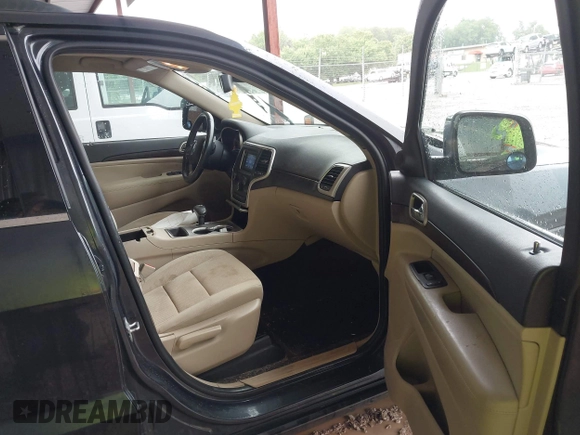 2014 Jeep Grand Cherokee Laredo with VIN 1C4RJEAG6EC206748, listed as a IAAI auction lot 42244421 with 198,217 mi miles and . Bid and sale history available at DreamBid. Image 5.
