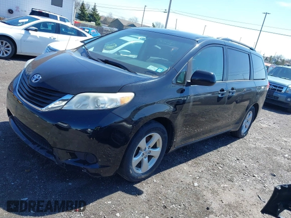 2014 Toyota Sienna LE AAS with VIN 5TDKK3DC4ES445998, listed as a IAAI auction lot 42093872 with 220,943 mi miles. Bid and sale history available at carsss.com. Image 2.