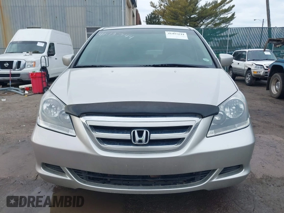 2006 Honda Odyssey EX-L z VIN 5FNRL38766B018014, wystawiony jako IAAI lot #41497144 z przebiegiem 230 225 mil mil oraz . Historia ofert i sprzedaży dostępna na DreamBid. Obrazek 12.