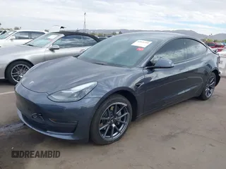 2022 Tesla Model 3 Long Range with VIN 5YJ3E1EB9NF164774, listed as a IAAI auction lot 41915755 with 39,625 mi miles and . Bid and sale history available at DreamBid. Image 2.