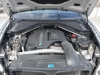 2011 BMW X5 35i with VIN 5UXZV4C52BL742911, listed as a IAAI auction lot 41845588 with 123,001 mi miles. Bid and sale history available at carsss.com. Image 10.