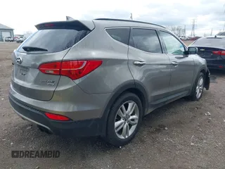 2013 Hyundai Santa Fe Sport z VIN 5XYZUDLA3DG114436, wystawiony jako IAAI lot #42084871 z przebiegiem 96 000 mil mil oraz . Historia ofert i sprzedaży dostępna na DreamBid. Obrazek 4.