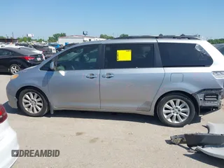 2012 Toyota Sienna XLE AAS with VIN 5TDYK3DC7CS185555, listed as a IAAI auction lot 42013098 with 140,969 mi miles. Bid and sale history available at carsss.com. Image 15.