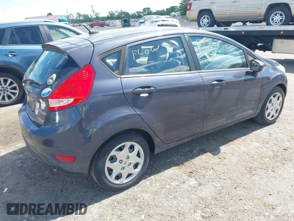 2013 Ford Fiesta S с VIN 3FADP4TJ9DM140744, выставлен на аукционе IAAI как лот 42319921 с пробегом 95 812 миль миль и . История ставок и продаж доступна на DreamBid. Изображение 4.