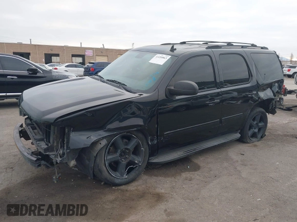 2013 Chevrolet Tahoe LT with VIN 1GNSKBE05DR152825, listed as a IAAI auction lot 41450863 with 157,305 mi miles and . Bid and sale history available at DreamBid. Image 18.