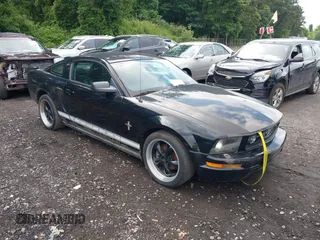 2007 Ford Mustang Deluxe with VIN 1ZVHT80N775337103, listed as a IAAI auction lot 42744248 with 118,857 mi miles and . Bid and sale history available at DreamBid. Image 1.