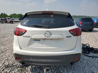 2016 Mazda CX-5 Grand Touring z VIN JM3KE4DY7G0864109, wystawiony jako Copart lot #59635865 z przebiegiem Nie podano mil oraz Czysty tytuł • Clean title. Historia ofert i sprzedaży dostępna na DreamBid. Obrazek 6.