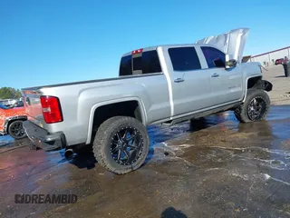 2015 GMC Sierra 2500HD available WiFi Denali with VIN 1GT120E87FF173940, listed as a IAAI auction lot 41843586 with 167,992 mi miles. Bid and sale history available at carsss.com. Image 4.
