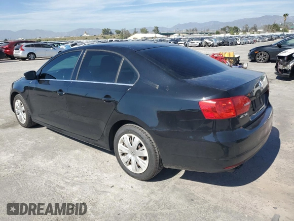 2013 Volkswagen Jetta SE with VIN 3VWDP7AJ8DM412583, listed as a Copart auction lot 49810235 with 180,595 mi miles and Clean title. Bid and sale history available at DreamBid. Image 2.