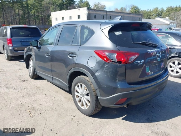 2015 Mazda CX-5 Touring with VIN JM3KE4CY3F0528246, listed as a IAAI auction lot 41892208 with 116,629 mi miles. Bid and sale history available at carsss.com. Image 14.