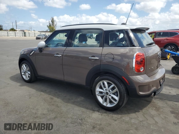 2014 MINI Countryman S with VIN WMWZC3C57EWP29072, listed as a Copart auction lot 54508905 with 105,192 mi miles and Clean Title. Bid and sale history available at DreamBid. Image 2.