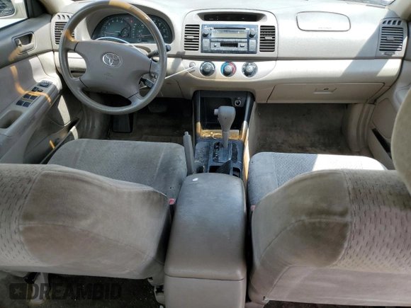 2002 Toyota Camry LE z VIN JTDBE32K620035753, wystawiony jako Copart lot #60176235 z przebiegiem 258 793 mil mil oraz Czysty tytuł • Clean title. Historia ofert i sprzedaży dostępna na DreamBid. Obrazek 8.