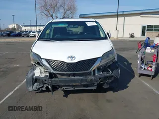 2015 Toyota Sienna SE with VIN 5TDXK3DC6FS627578, listed as a IAAI auction lot 41568684 with 124,138 mi miles and . Bid and sale history available at DreamBid. Image 12.