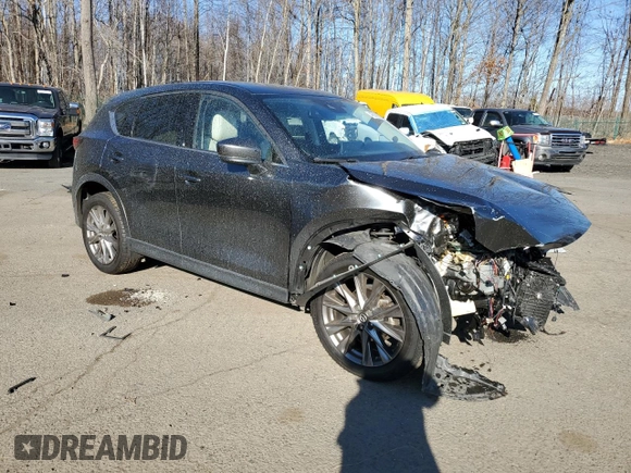 2021 Mazda CX-5 Grand Touring with VIN JM3KFBDM1M0489859, listed as a Copart auction lot 48688905 with 36,882 mi miles and Salvage Title. Bid and sale history available at DreamBid. Image 4.