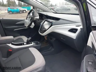2021 Chevrolet Bolt EV 1LT with VIN 1G1FW6S08M4104963, listed as a IAAI auction lot 41827650 with 34,505 mi miles. Bid and sale history available at carsss.com. Image 5.