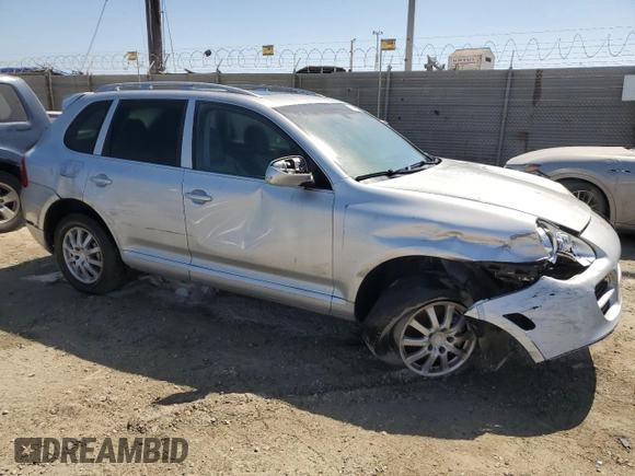2005 Porsche Cayenne with VIN WP1AA29P55LA23789, listed as a Copart auction lot 61156574 with 166,621 mi miles and Clean Title. Bid and sale history available at carsss.com. Image 4.