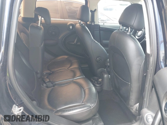 2014 MINI Countryman S with VIN WMWZC3C54EWP26131, listed as a IAAI auction lot 42012162 with 125,869 mi miles and . Bid and sale history available at DreamBid. Image 8.