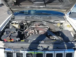 1996 Jeep Grand Cherokee Laredo z VIN 1J4GZ58Y5TC186403, wystawiony jako IAAI lot #41562270 z przebiegiem 205 797 mil mil oraz . Historia ofert i sprzedaży dostępna na DreamBid. Obrazek 10.