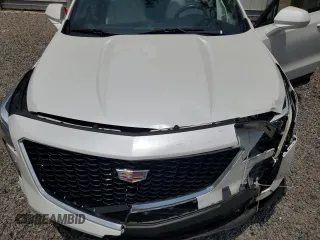 2019 Cadillac XT4 FWD Sport z VIN 1GYFZER47KF187301, wystawiony jako Copart lot #57715115 z przebiegiem 64 246 mil mil oraz Szkody całkowita. Historia ofert i sprzedaży dostępna na DreamBid. Obrazek 12.