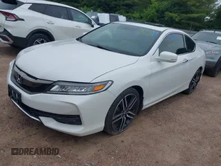 2016 Honda Accord Touring with VIN 1HGCT2B09GA007614, listed as a IAAI auction lot 42532621 with 200,935 mi miles and . Bid and sale history available at DreamBid. Image 2.