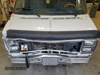 1990 GMC Vandura z VIN 1GDEG25K8L7521773, wystawiony jako Copart lot #84875104 z przebiegiem 171 457 mil mil oraz Tytuł czysty. Historia ofert i sprzedaży dostępna na DreamBid. Obrazek 12.