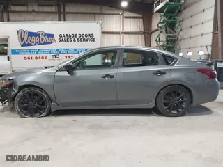 2018 Nissan Altima 2.5 SV with VIN 1N4AL3AP5JC470135, listed as a IAAI auction lot 41801045 with 122,452 mi miles. Bid and sale history available at carsss.com. Image 14.