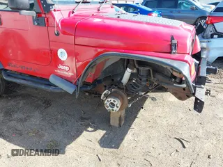 2004 Jeep Wrangler Sport Right Hand Drive with VIN 1J4F449S74P796957, listed as a IAAI auction lot 41987562 with 106,730 mi miles and . Bid and sale history available at carsss.com. Image 6.