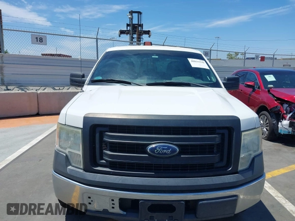 2014 Ford F-150 XL with VIN 1FTEX1CMXEFD13082, listed as a IAAI auction lot 40035539 with 204,751 mi miles and . Bid and sale history available at DreamBid. Image 13.