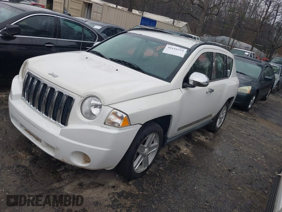 2007 Jeep Compass Sport with VIN 1J8FT47W27D256252, listed as a IAAI auction lot 41616554 with 210,125 mi miles. Bid and sale history available at carsss.com. Image 2.