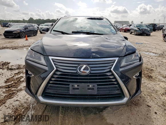 2016 Lexus RX 350 с VIN 2T2ZZMCA9GC001717, выставлен на аукционе Copart как лот 63850605 с пробегом 74 609 миль миль и Списание • Salvage title. История ставок и продаж доступна на DreamBid. Изображение 5.