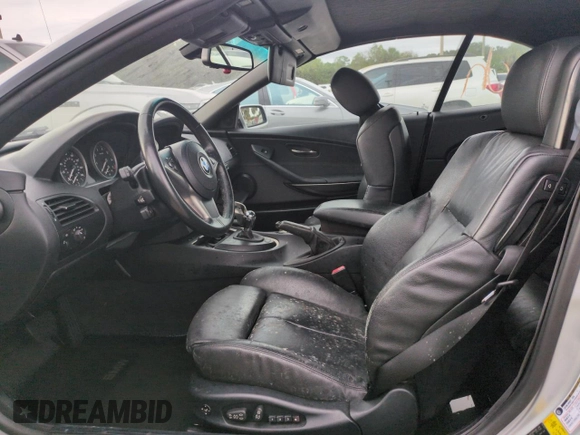 2006 BMW 6 Series 650Ci z VIN WBAEK13406CN72159, wystawiony jako Copart lot #75078214 z przebiegiem Nie podano mil oraz Szkoda całkowita • Salvage title. Historia ofert i sprzedaży dostępna na DreamBid. Obrazek 7.