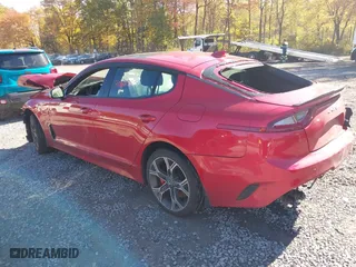 2018 Kia Stinger GT2 with VIN KNAE55LC0J6019590, listed as a IAAI auction lot 40627501 with 90,021 mi miles. Bid and sale history available at carsss.com. Image 3.
