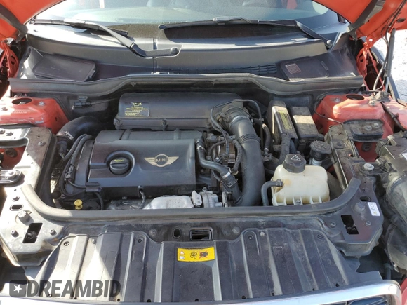 2012 MINI Countryman S with VIN WMWZC3C50CWL82827, listed as a Copart auction lot 57154755 with 149,751 mi miles and Salvage title. Bid and sale history available at DreamBid. Image 11.