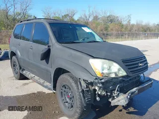 2005 Lexus GX 470 z VIN JTJBT20X150087128, wystawiony jako IAAI lot #41124756 z przebiegiem 221 052 mil mil oraz . Historia ofert i sprzedaży dostępna na DreamBid. Obrazek 1.