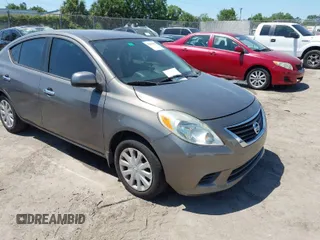 2014 Nissan Versa S with VIN 3N1CN7AP9EL860012, listed as a IAAI auction lot 42062155 with 87,809 mi miles. Bid and sale history available at carsss.com. Image 1.