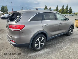 2016 Kia Sorento EX with VIN 5XYPH4A54GG094512, listed as a Copart auction lot 64965125 with 162,565 mi miles and Salvage title. Bid and sale history available at DreamBid. Image 3.