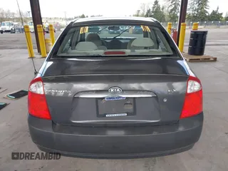 2004 Kia Spectra LX with VIN KNAFE121145031237, listed as a IAAI auction lot 41954550 with 133,744 mi miles. Bid and sale history available at carsss.com. Image 16.