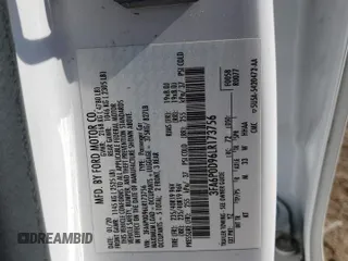 2020 Ford Fusion Titanium with VIN 3FA6P0D96LR173756, listed as a Copart auction lot 56467885 with 77,217 mi miles and Salvage title. Bid and sale history available at DreamBid. Image 12.