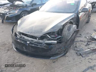 2022 Tesla Model S Plaid with VIN 5YJSA1E6XNF460235, listed as a IAAI auction lot 40951359 with 18,922 mi miles and . Bid and sale history available at DreamBid. Image 6.