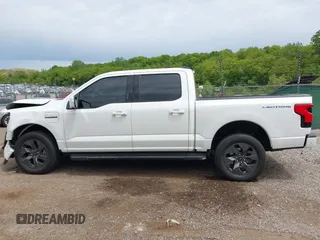 2022 Ford F-150 Lightning Pro with VIN 1FTVW1EL3NWG16132, listed as a IAAI auction lot 42362459 with 16,509 mi miles and . Bid and sale history available at DreamBid. Image 15.