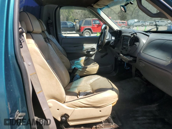 1998 Ford F-150 z VIN 1FTZF176XWNB03959, wystawiony jako Copart lot #49043105 z przebiegiem 300 884 mil mil oraz Szkoda całkowita • Salvage title. Historia ofert i sprzedaży dostępna na DreamBid. Obrazek 11.