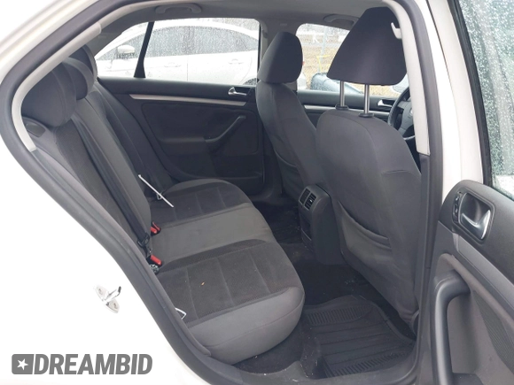 2009 Volkswagen Jetta S z VIN 3VWJZ71K49M129501, wystawiony jako IAAI lot #41461767 z przebiegiem 250 552 mil mil oraz . Historia ofert i sprzedaży dostępna na DreamBid. Obrazek 8.