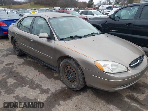 2005 Ford Taurus SE with VIN 1FAFP53215A127489, listed as a IAAI auction lot 40940239 with 127,180 mi miles. Bid and sale history available at carsss.com. Image 1.