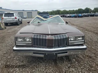 1977 Oldsmobile Cutlass z VIN 3J57R7M186772, wystawiony jako Copart lot #70648914 z przebiegiem 43 326 mil mil oraz Szkody całkowita. Historia ofert i sprzedaży dostępna na DreamBid. Obrazek 5.