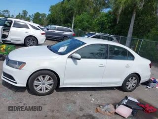 2017 Volkswagen Jetta S with VIN 3VW2B7AJXHM374687, listed as a IAAI auction lot 42596302 with 63,728 mi miles and . Bid and sale history available at DreamBid. Image 14.