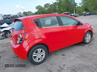 2013 Chevrolet Sonic LT with VIN 1G1JC6SHXD4172738, listed as a IAAI auction lot 41872916 with 105,829 mi miles. Bid and sale history available at carsss.com. Image 4.