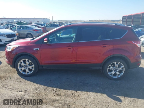 2014 Ford Escape Titanium with VIN 1FMCU9J98EUC24857, listed as a IAAI auction lot 41973037 with 160,634 mi miles. Bid and sale history available at carsss.com. Image 15.