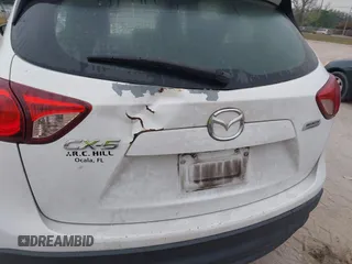 2016 Mazda CX-5 Sport with VIN JM3KE2BY1G0875484, listed as a IAAI auction lot 41838122 with 166,986 mi miles. Bid and sale history available at carsss.com. Image 20.